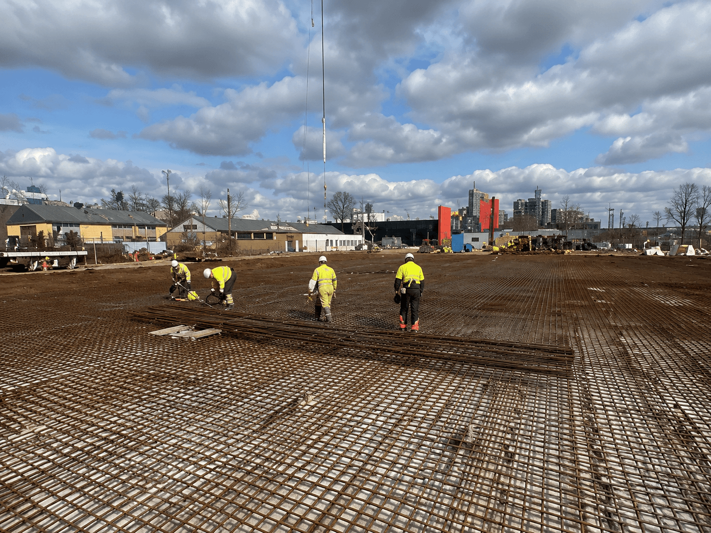 Reinforcement installation across a large construction slab